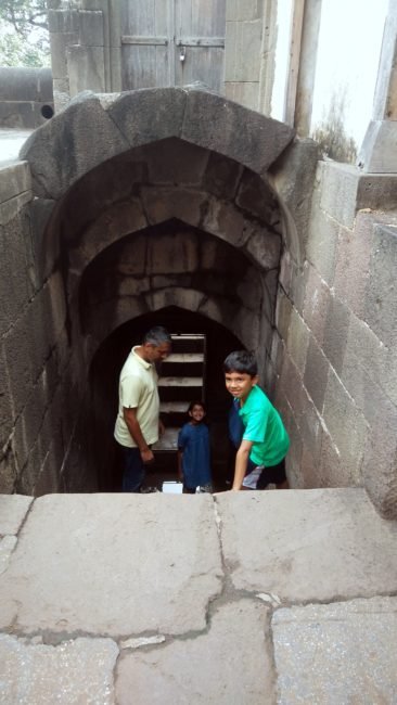 Children playing with their father on the steps of Shaniwar Wada. Built in 1732, Shaniwarwada is a historical fortification in the city of Pune in Maharashtra, India. Read more about the The former love-nest of Bajirao and Kashi and Bajirao and Mastani.
