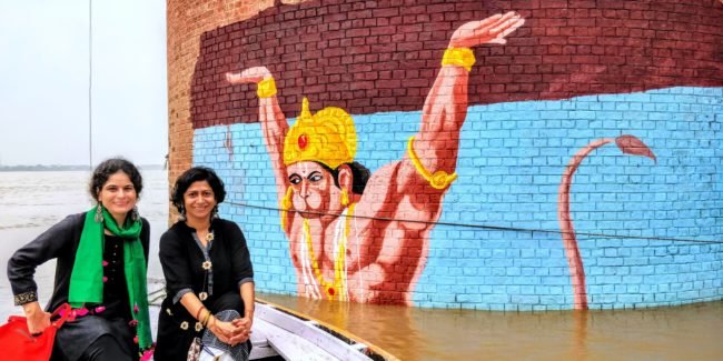 women sitting on boat in ganges varanasi