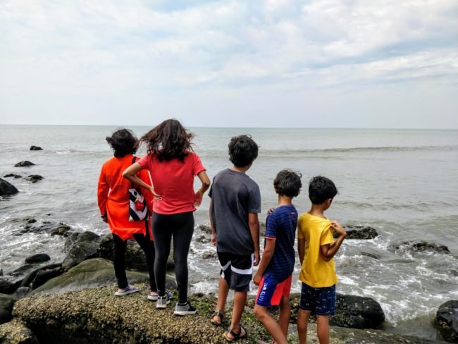 Kids at the Harihareshwar rocky beach n Konkan Maharashtra, India