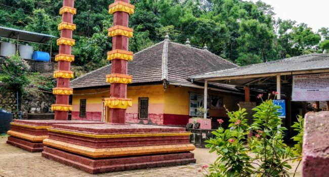 16th century red roof red and yellow coloured Shiva temple in Harihareshwar in konkan near diveagar beach in Maharashtra