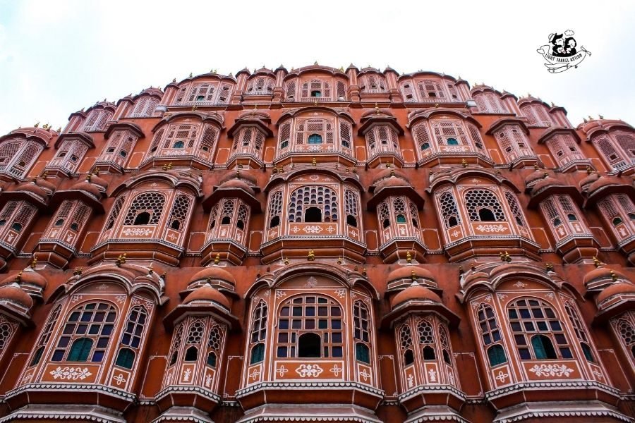 Jaipur's Hawa Mahal (Wind Palace) is the most iconic landmark in Jaipur. The facade of the Hawa Mahal which it is believed to resemble Lord Krishna's crown, never fails to arouse curiosity. This complete guide to the Hawa Mahal will tell you everything you need to know about it and how to visit it #lighttravelaction #hawamahal #hawamahljaipur #hawamahalphotography # hawamahaljaipurarchitecture #jaipurindia #jaipurtravel #pinkcityjaipur #pinkcityjaipurrajasthanindia