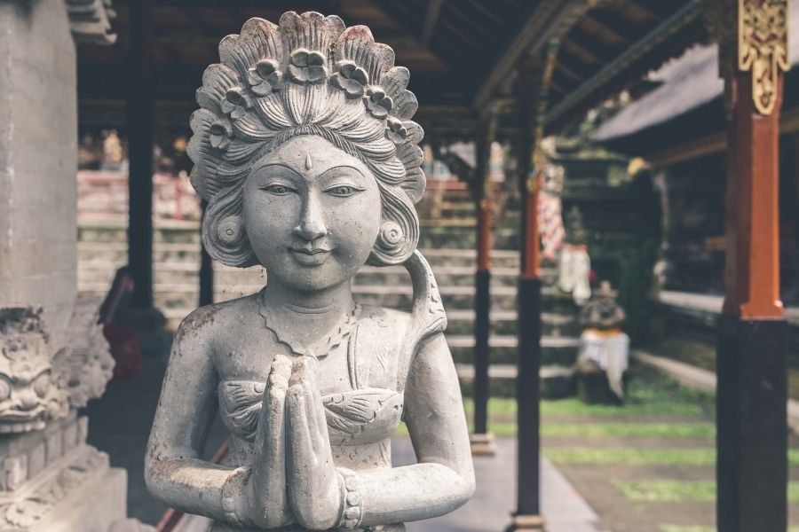 lighttravelaction-namaste-statue